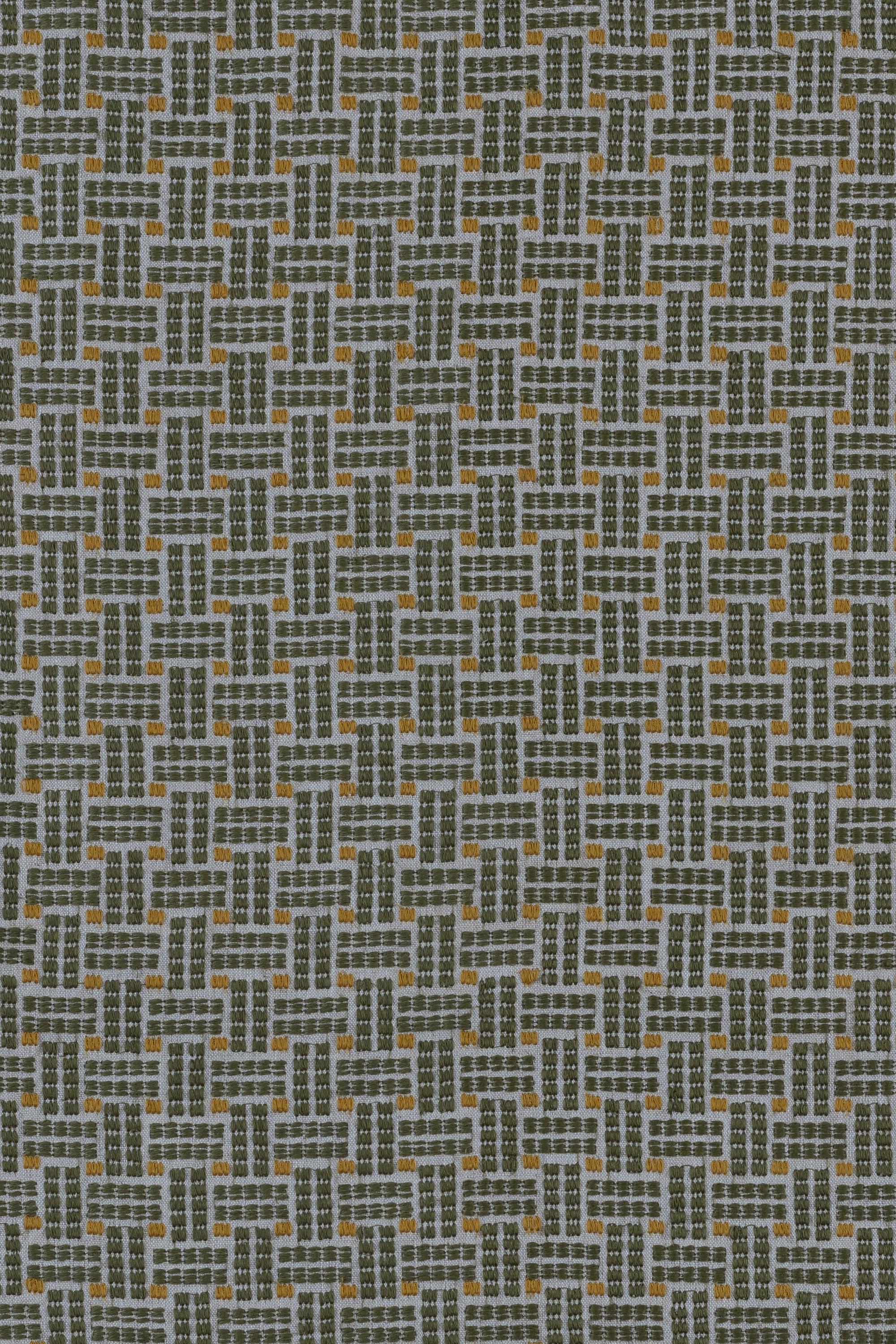 Embroidered fabric in a dashed basketweave design in sage green with yellow accents.