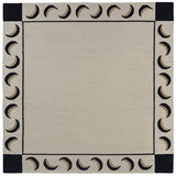 Flatweave rug with a crescent moon border in cream, taupe and black.