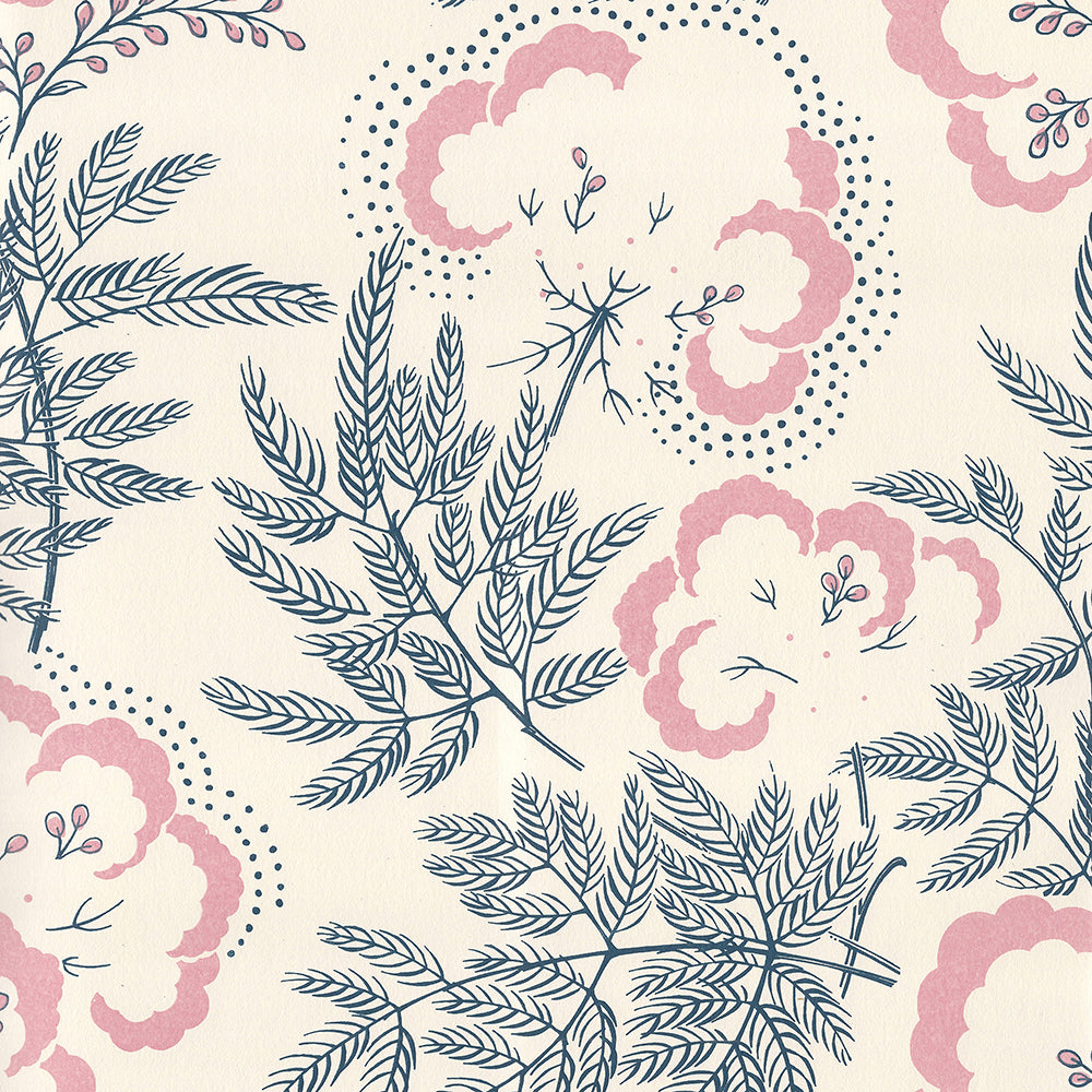 Detail of wallpaper in an intricate floral print in pink and navy on a cream field.