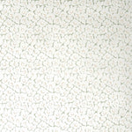 Wallpaper in a minimal floral print in rust and light green on a cream field.