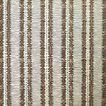 Detail of wallpaper in a dense tribal stripe pattern in shades of cream, gray and brown.