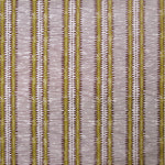 Detail of wallpaper in a dense tribal stripe pattern in shades of cream, mustard and brown.