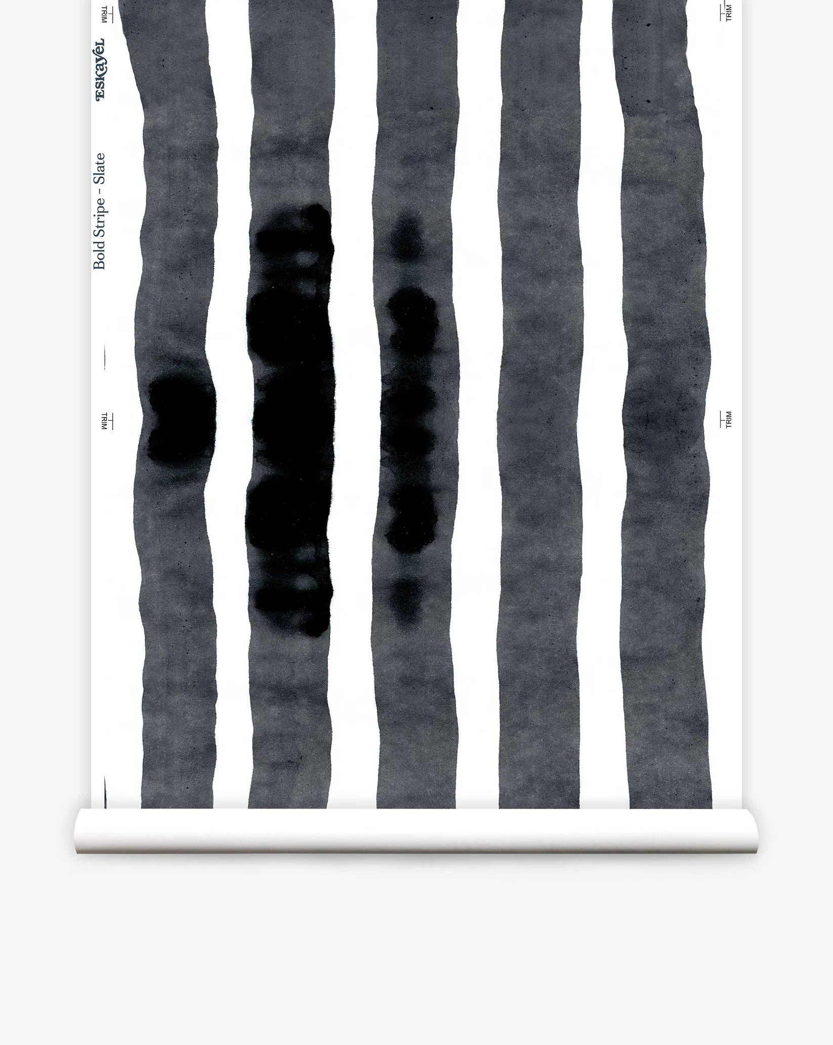 Wallpaper roll  with bold watercolor stripes in black and white on a white background. 
