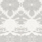 Detail of wallpaper in a painterly ikat print in shades of gray and cream.