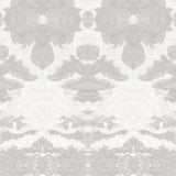 Detail of wallpaper in a painterly ikat print in shades of gray and cream.