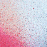 Close up of paint splatters in red and blue.