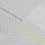 Detail of the Amelia Rug in Peridot featuring a minimalist broken stripe pattern, overlayed with thin white diagonal lines. The broken stripes are a mix of white, grey, and shades of yellow with kelly green accents, all on a light grey field. 