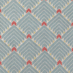 The Arrow Rug in Powder Blue-Coral features a dense pattern of nesting arrow shapes in soft blue with accents of coral and yellow on an ivory field. 