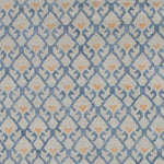 Detail of the Avesta Rug in Blue, a blue lattice pattern on a beige field with small orange heart accents. 