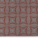 Detail of the Boe rug in Tivoli, featuring a pattern of crimsoncurved segments with light blue circles on a heather purple field. 