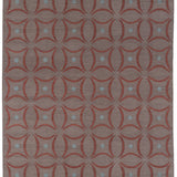 Full size Boe rug in Tivoli, featuring a pattern of crimsoncurved segments with light blue circles on a heather purple field. 