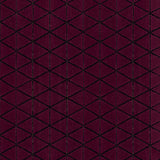 Detail of the Bucky Rug in berry, features a wide black border with a wine colored lattice field with a metallic sheen. 