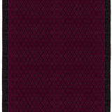 Full size Bucky Rug in berry, features a wide black border with a wine colored lattice field with a metallic sheen. 