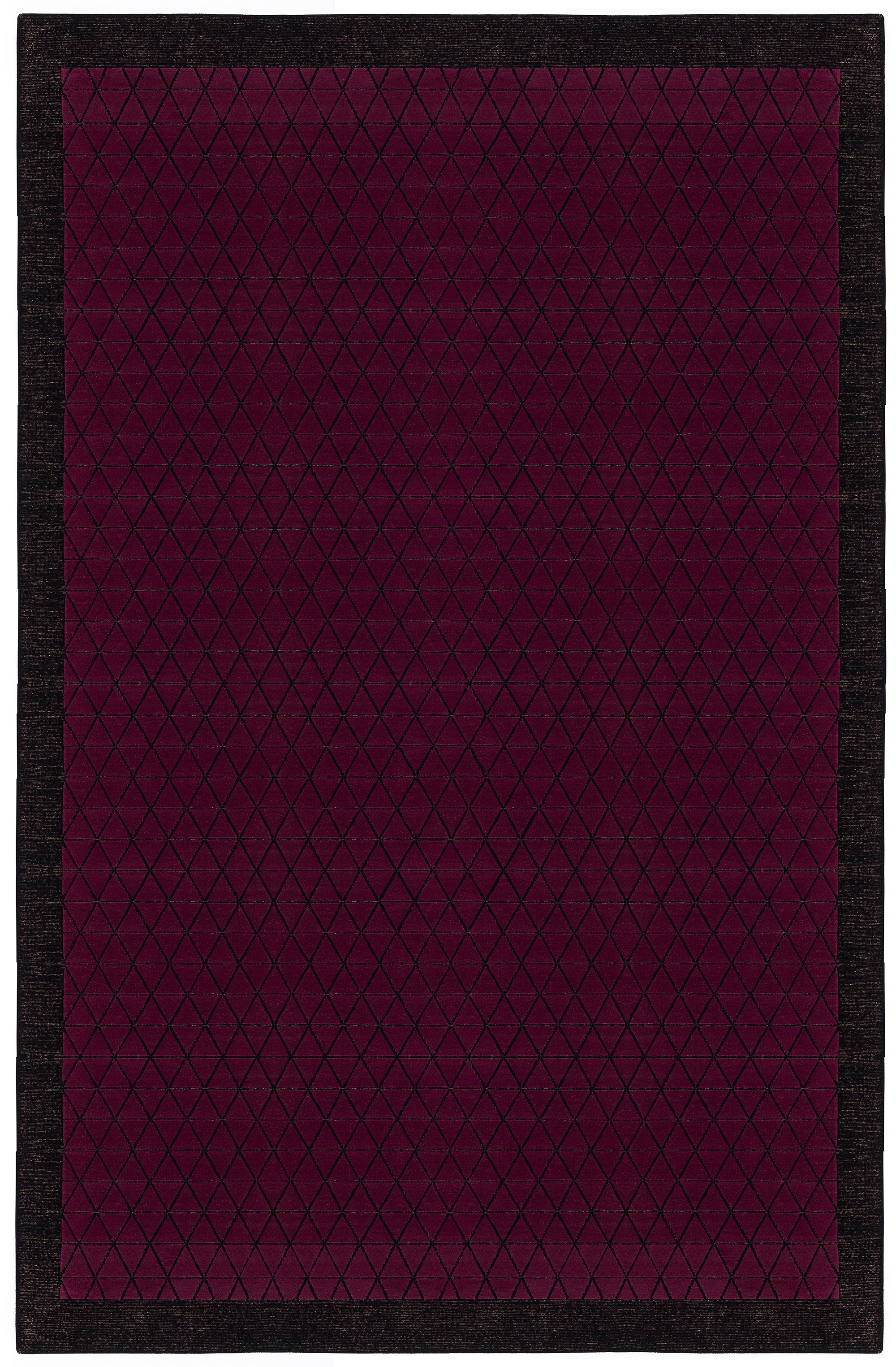 Full size Bucky Rug in berry, features a wide black border with a wine colored lattice field with a metallic sheen. 