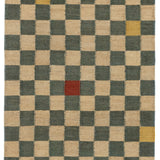 Detail of the Checkerboard Rug in bishop, a blue and white checkered pattern with random accents of red and yellow. 