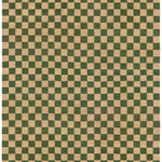 Detail of the Checkerboard Rug in Pawn, a green and tan checkered pattern. 