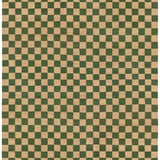 Detail of the Checkerboard Rug in Pawn, a green and tan checkered pattern. 