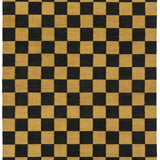 Detail of the Checkerboard Rug in Queen, a black and ochre yellow checkered pattern. 