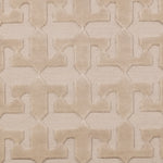 Detail of the Iseo Rug in Pearl, a textural monochromatic abstract geometric pattern in ivory. 