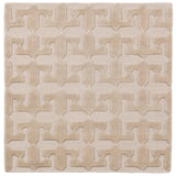 Detail of the Iseo Rug in Pearl, a textural monochromatic abstract geometric pattern in ivory. 