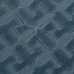 Detail of the Rug in Stormy Sky, a textural monochromatic abstract geometric pattern in blue. 