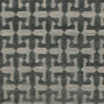 Detail of the Iseo Rug in Winter Sky, a textural monochromatic abstract geometric pattern in slate grey. 