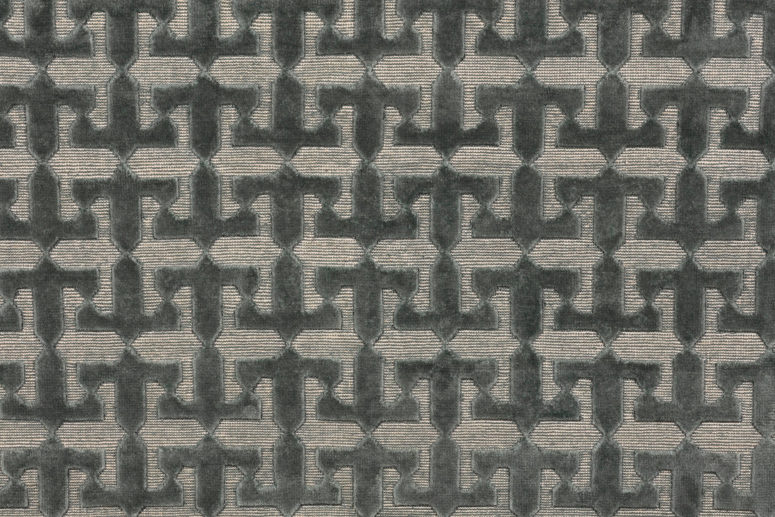 Detail of the Iseo Rug in Winter Sky, a textural monochromatic abstract geometric pattern in slate grey. 