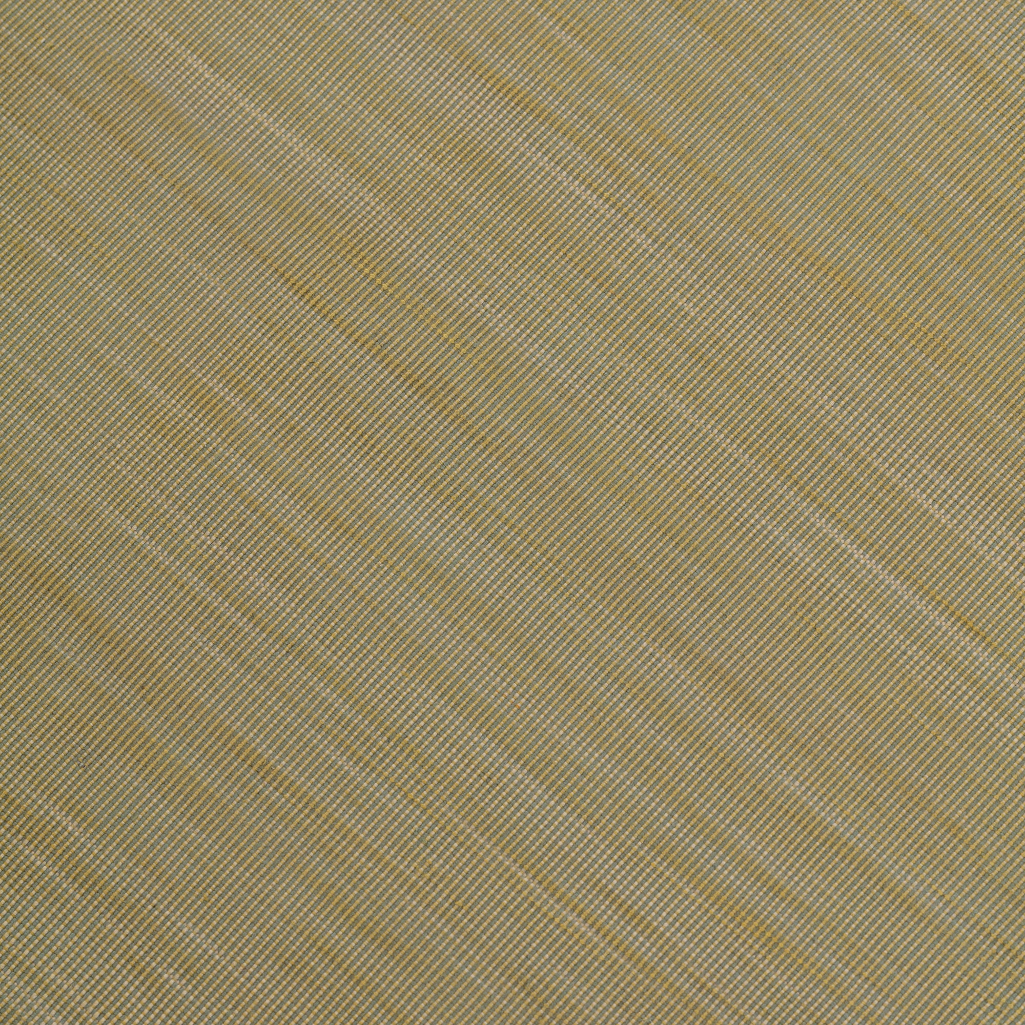 Detail of of the Moire Rug in Artemesia, a subtle striated pattern in lime green. 
