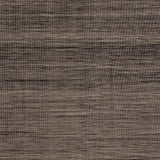 Detail of the Moire Rug in Rockpool, a subtle striated pattern tan and black. 