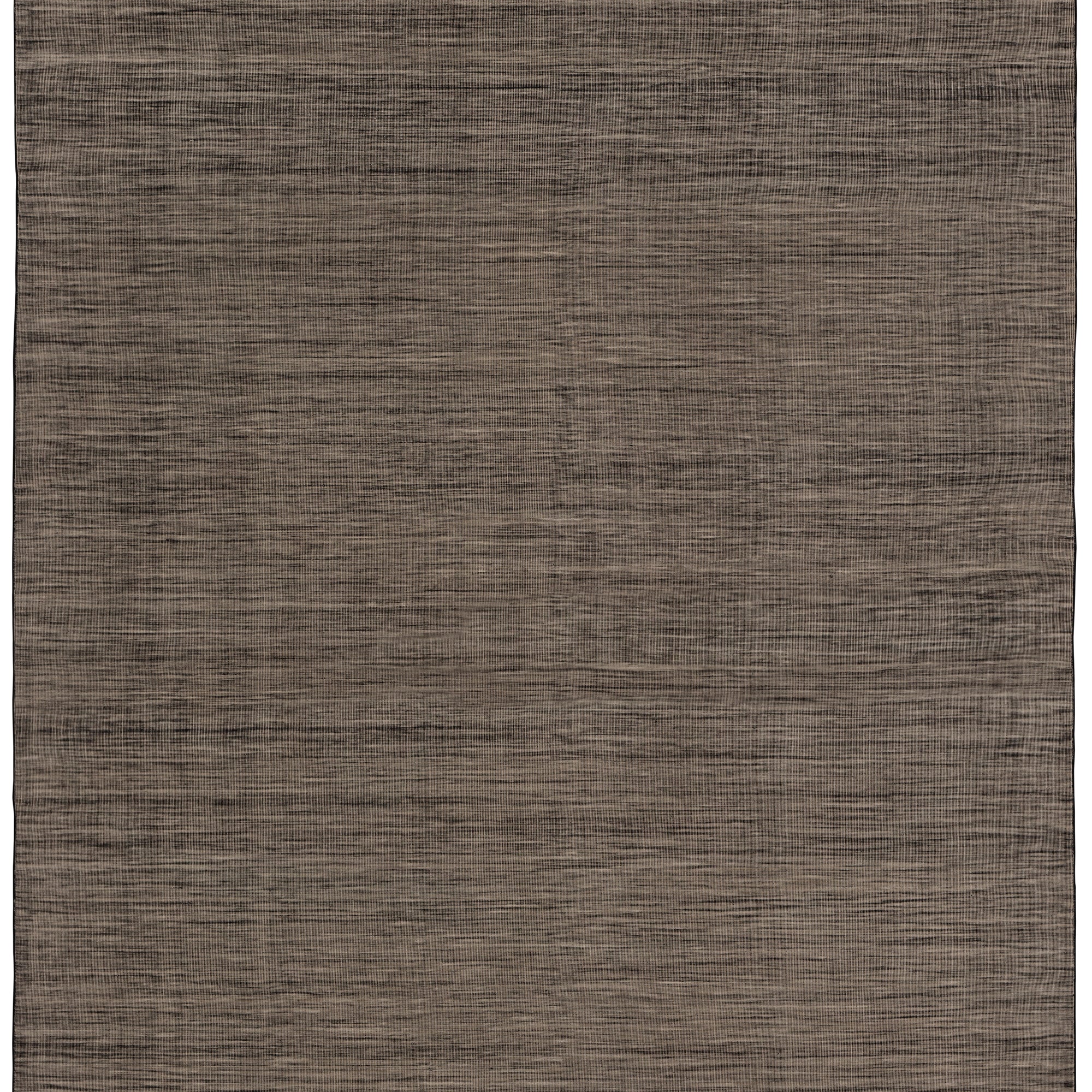 Moire Rug in Rockpool, a subtle striated pattern tan and black. 
