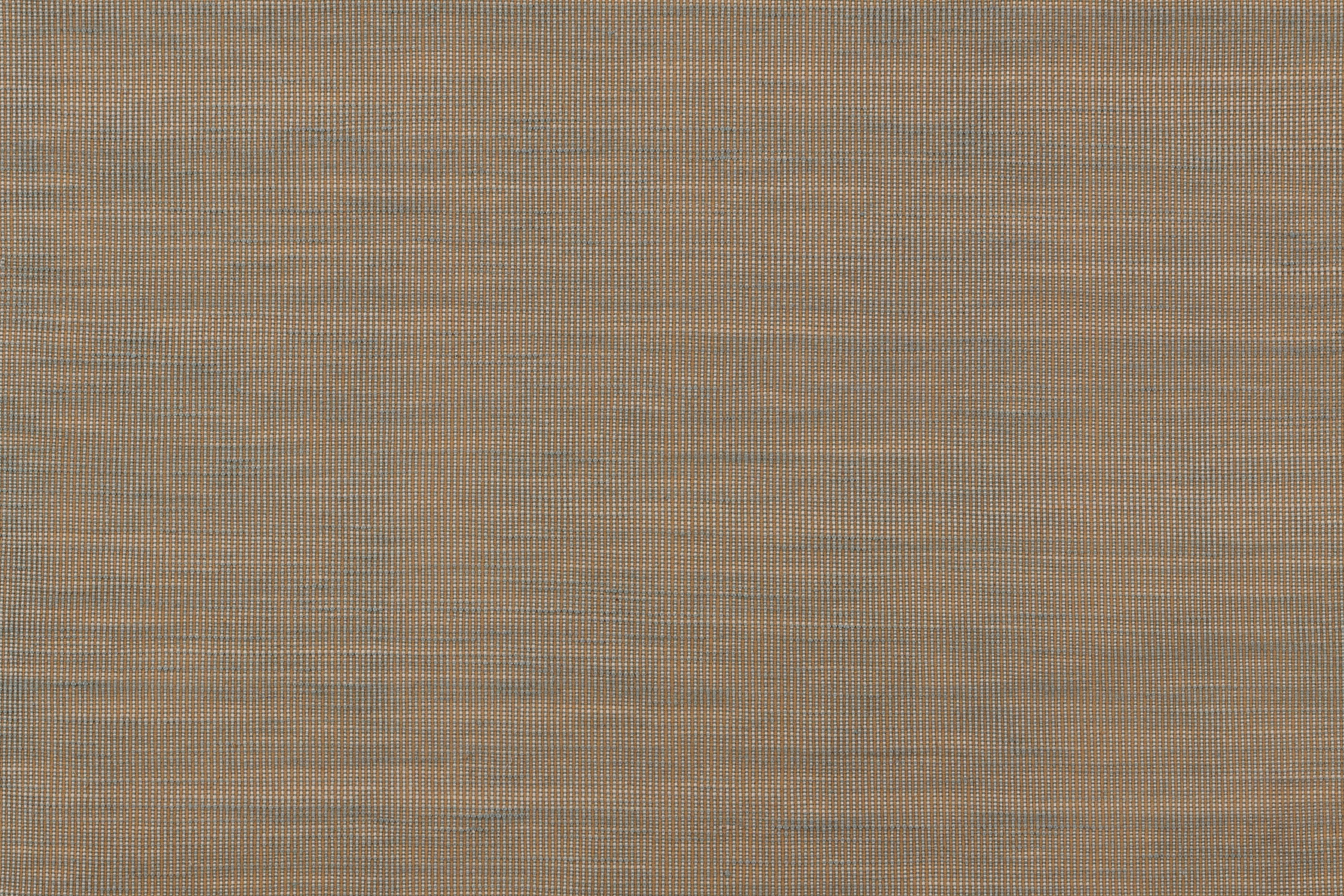 Detail of the Moire Rug in Sand-Pebble, a subtle striated pattern in warm taupe. 