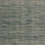 Detail of the Moire Rug in Sea Breeze, a subtle striated pattern in teal and off white. 