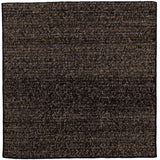 Detail of the Penta Rug in Night Fall, a subtle striated pattern in black and taupe. 