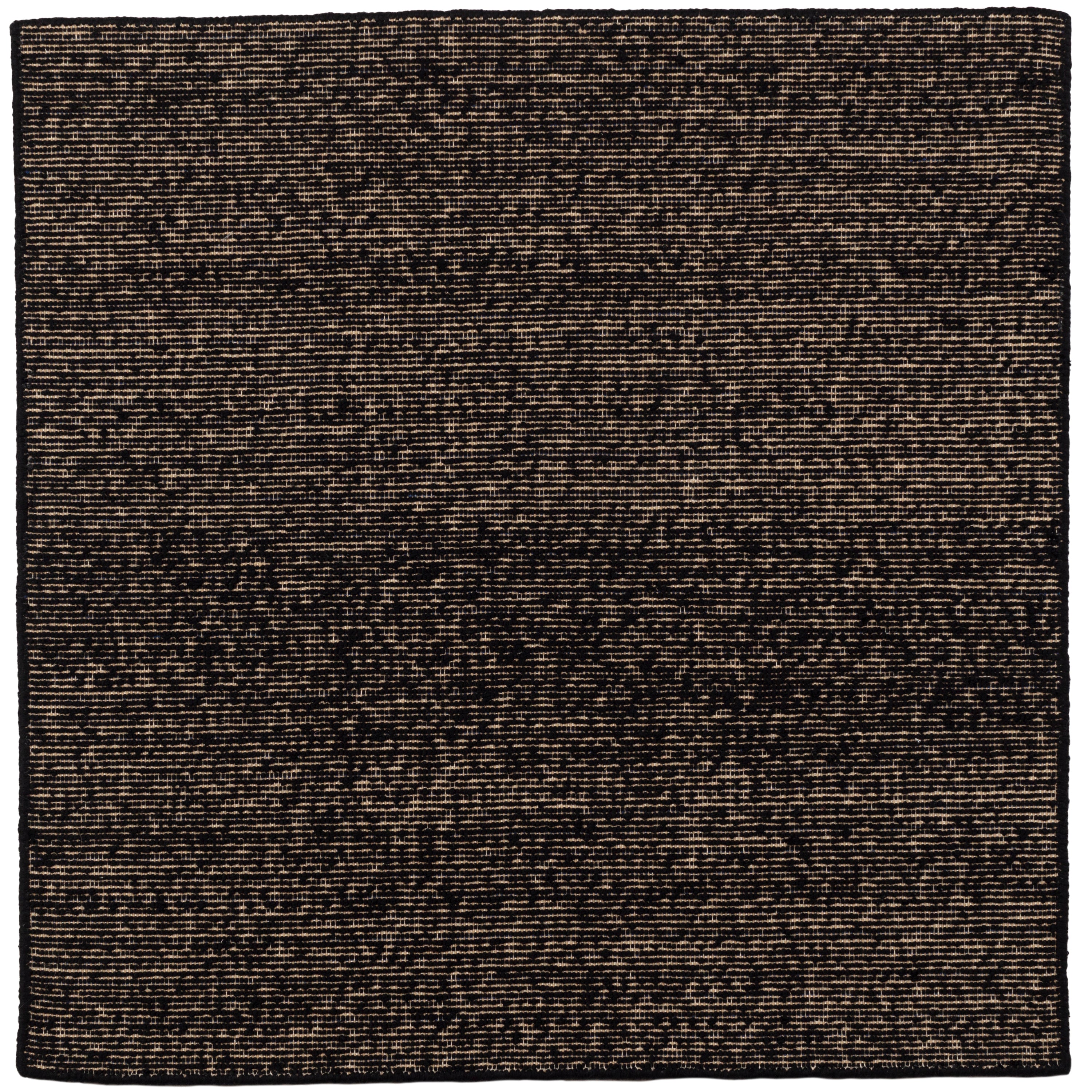 Detail of the Penta Rug in Night Fall, a subtle striated pattern in black and taupe. 