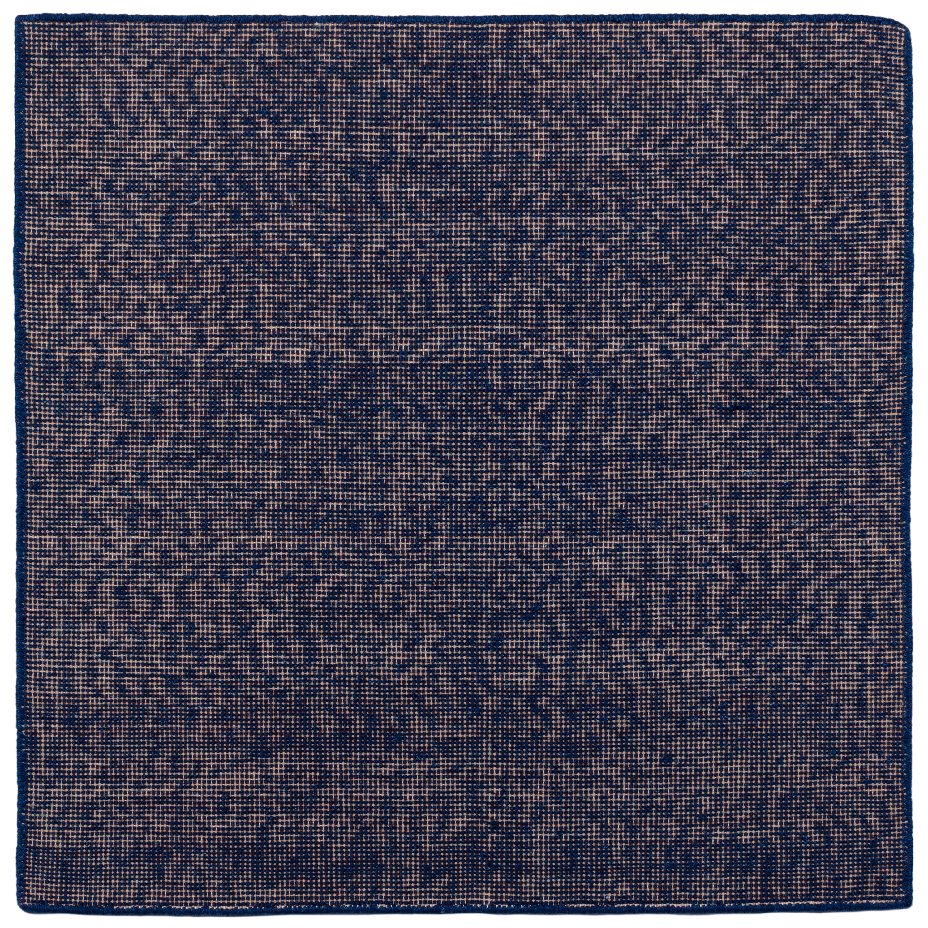 Detail of the Penta Rug in Tempestl, a subtle striated pattern in indigo blue and taupe. 