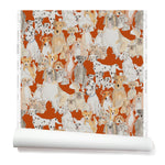 Partially unrolled wallpaper with a pattern of many different types of illustrated watercolor dogs. Background is red.