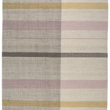 Jasper Waffle Rug in Red Fossile, widely spaced stripes of yellow, pink, red, white and black on a split light grey fand ivory field. 