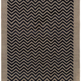 Full size Penta Chevron Rug in Jet, a black chevron pattern on a taupe field with a wide solid border. 