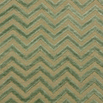 Detail of the Penta Chevron Rug in Pale Jade a light green chevron pattern on a lime green  field with a wide solid border. 