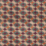 Petite Alhambra Rug featuring a pattern of linked circles that create a star like lattice in coral, taupe, turquoise and royal purple. 