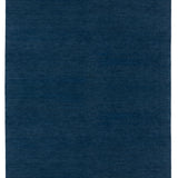 Full Size Plain Stitched Border Rug in Prussian Blue, a solid indigo rug with a black border with black border with blue and taupe dashes. 
