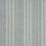 Wool broadloom carpet swatch in a light blue colorway mottled with gray and blue fibers.