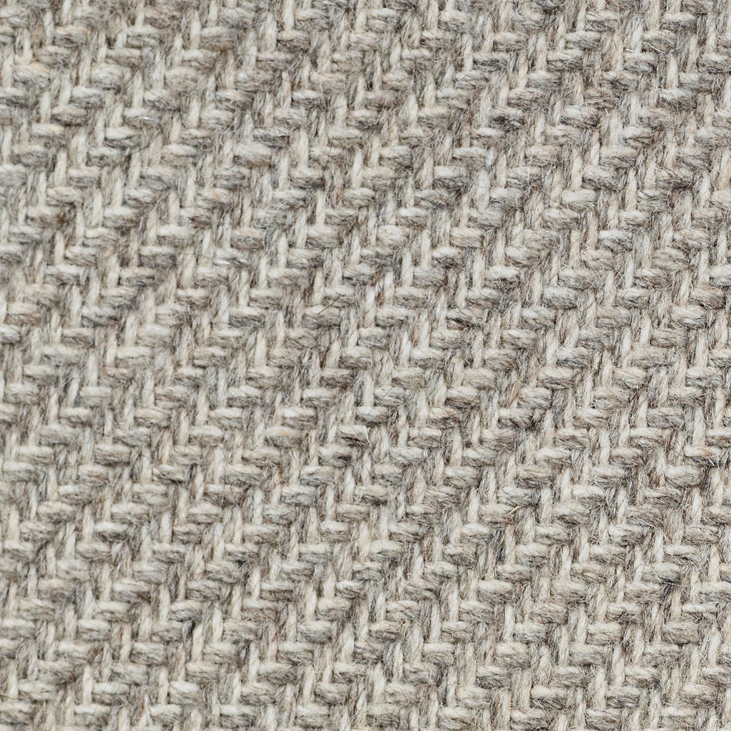 Wool broadloom carpet swatch in a high-pile diagonal stripe in mottled gray and cream.