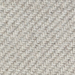 Wool broadloom carpet swatch in a high-pile diagonal stripe in mottled light gray and cream.