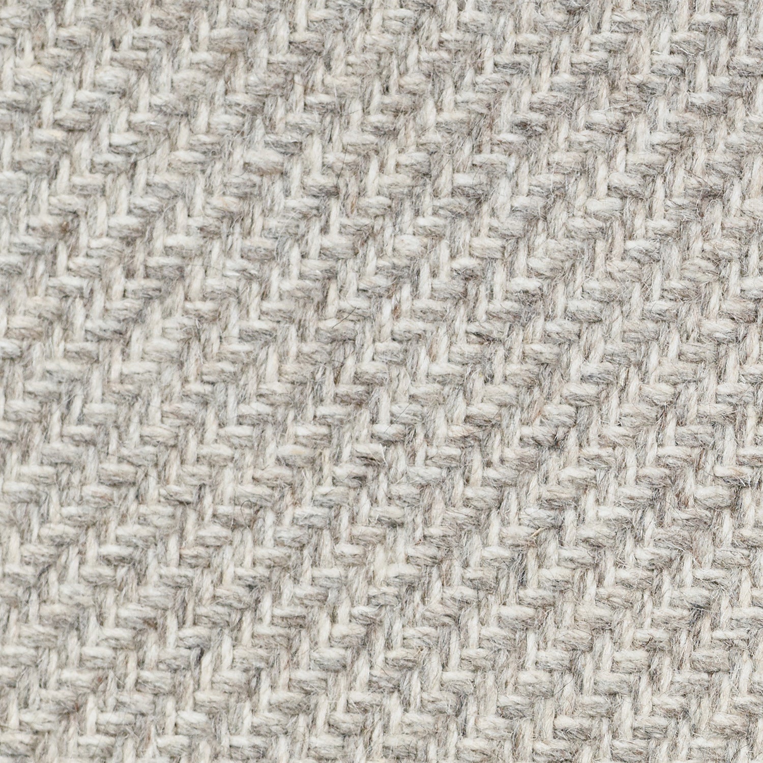 Wool broadloom carpet swatch in a high-pile diagonal stripe in mottled light gray and cream.