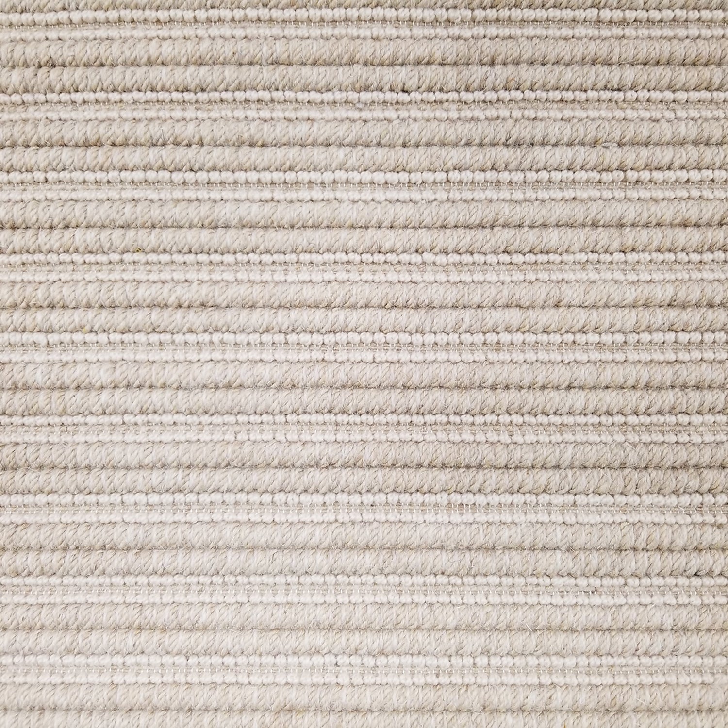 Wool broadloom carpet swatch in a textured stripe weave in a cream colorway.