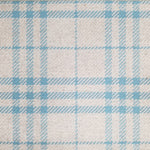 Wool broadloom carpet swatch in a blue and tan plaid pattern.