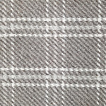 Wool broadloom carpet swatch in houndstooth plaid in shades of gray and cream.