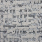 Wool-polyester broadloom carpet swatch in an impressionistic repeating pattern of white on a silver field.