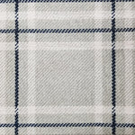 Wool broadloom carpet swatch in a plaid print in shades of cream, tan and navy.